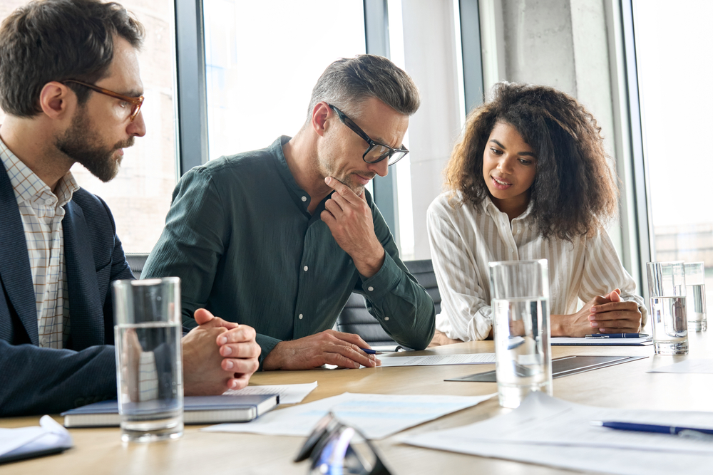 A group of people talking on a blog about mid-year financial check in