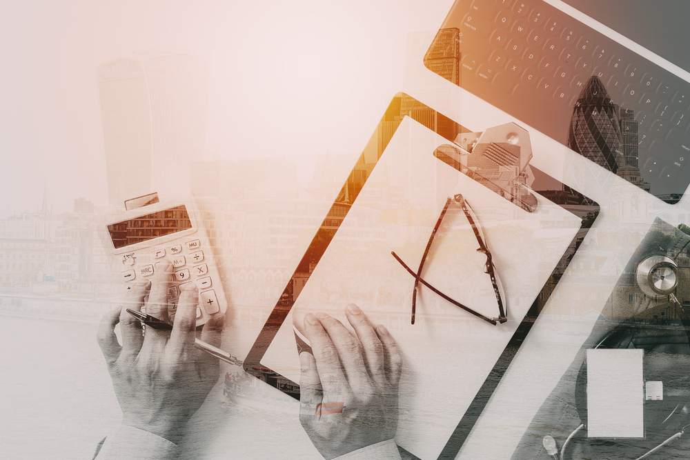 Someone doing taxes on a blog about open enrollment