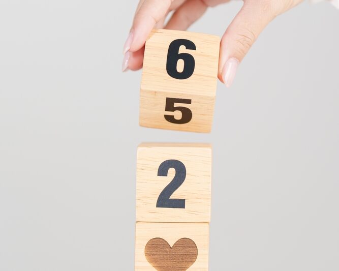 Blocks being placed on top of each other on a blog about year-end charitable giving