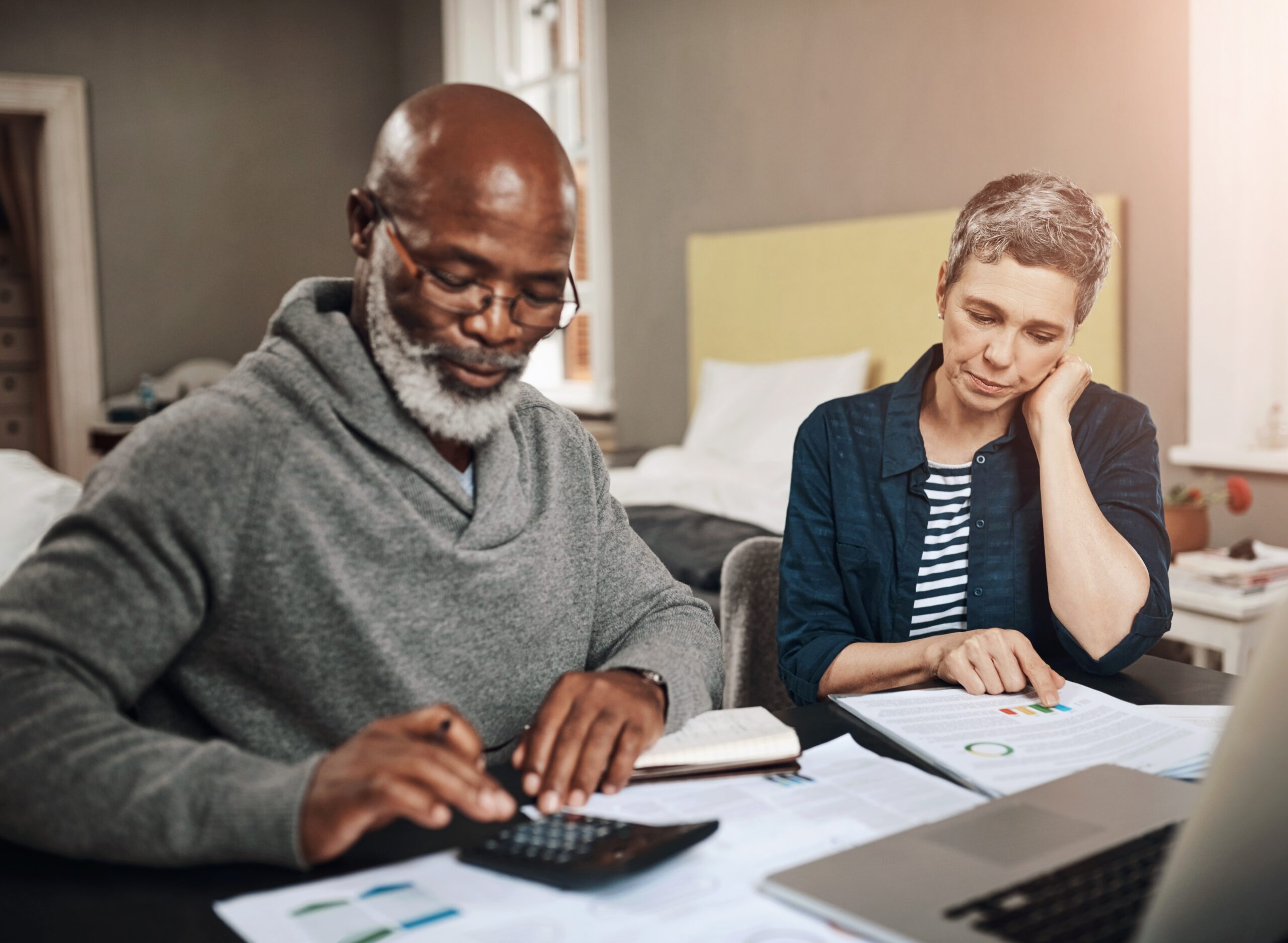 two people doing work about financial planning basics