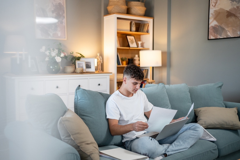 A teenager looking at things they need to complete before turning 18